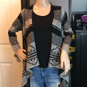 Rue 21 size medium gray and black. Long on sides